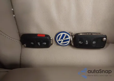 2012 Volkswagen Eos Executive z USA, uszkodzony, nr VIN WVWFW7AH0CV009066